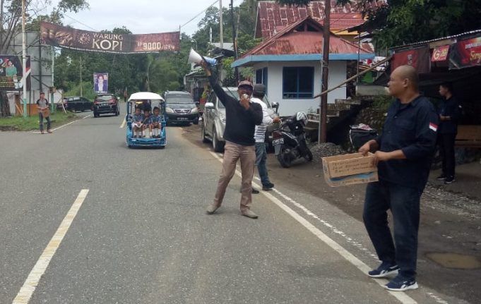 Pemuda Lolak Dan Wartawan SJB Bolmong gelar Aksi Penggalangan Dana Banjir Bandang Domisil